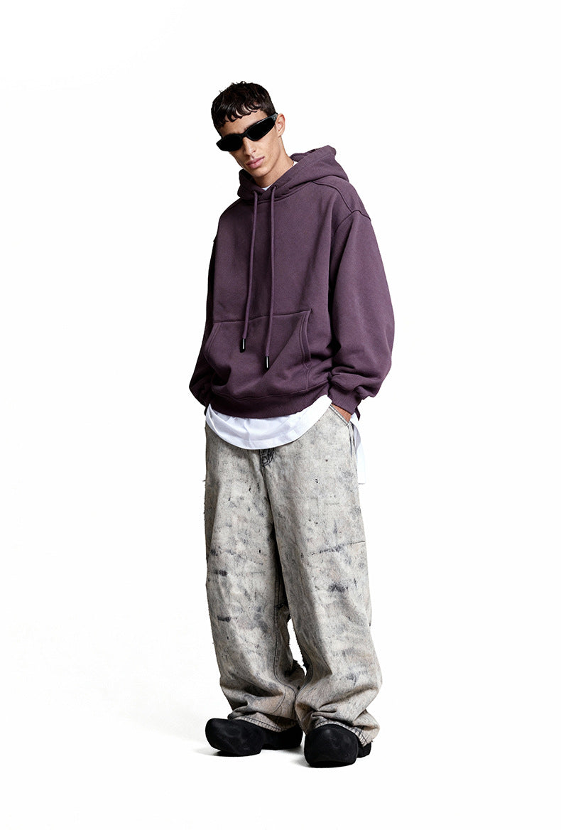 Purple oversized hoodie side view on model, drop shoulder