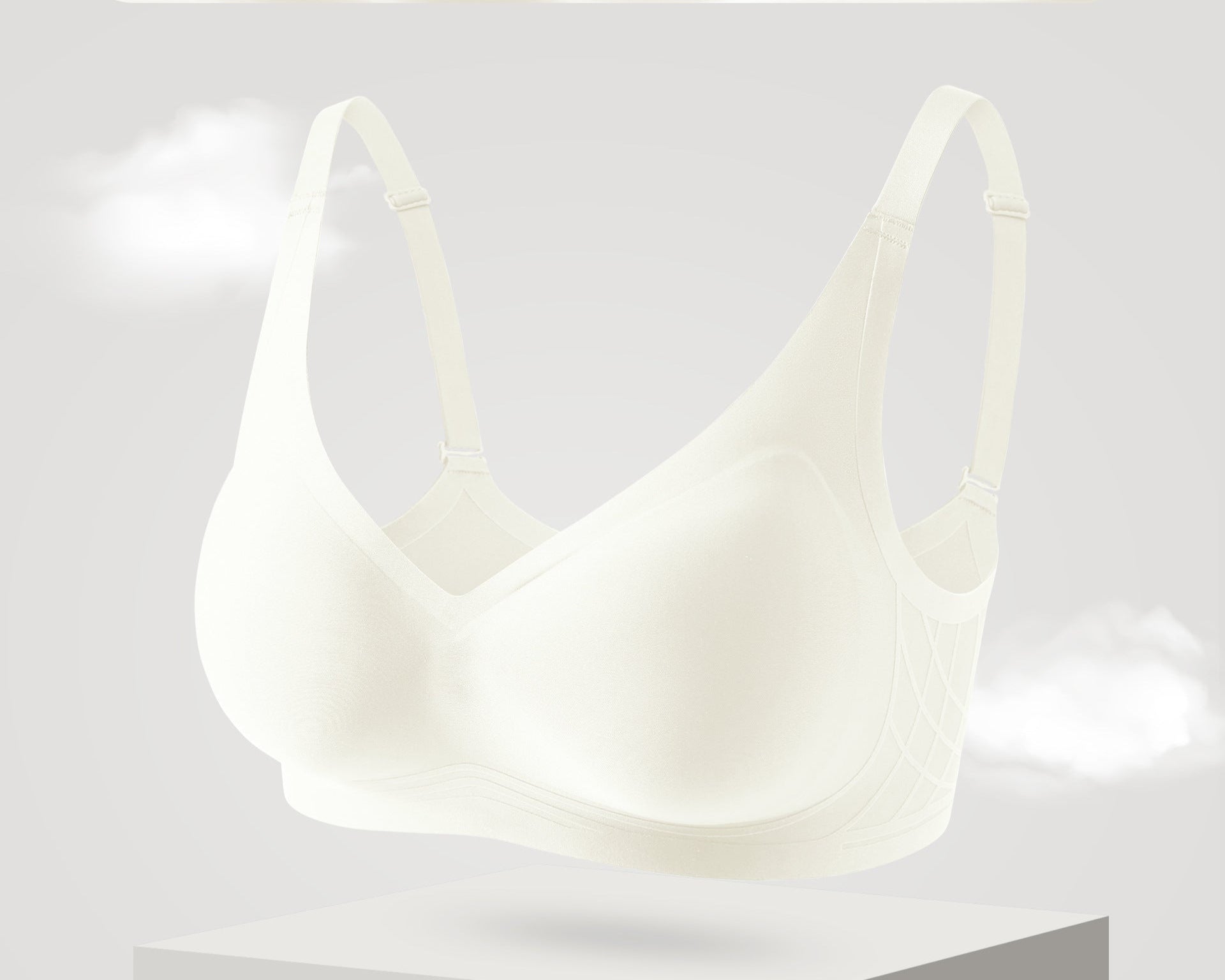 Seamless white push-up bra with breathable cups, elastic support, and a smooth fit.