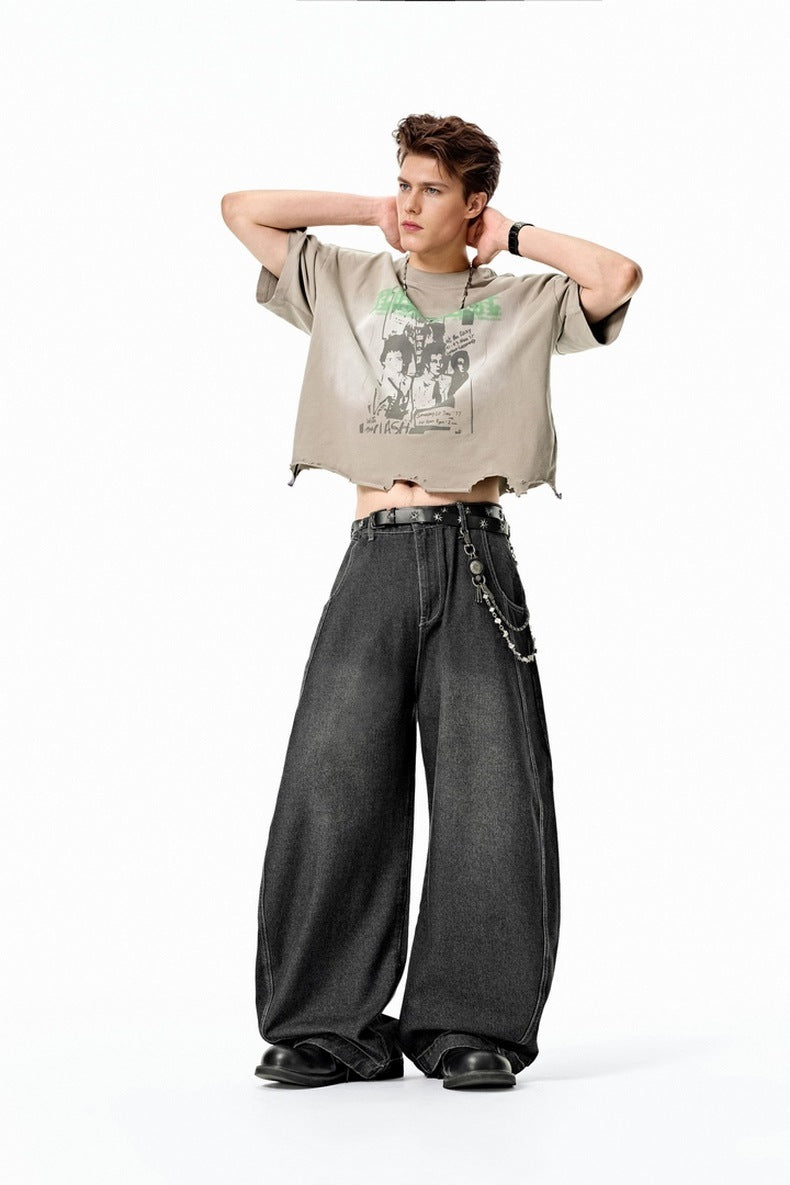 Black mid rise wide leg jeans front stance, extra-loose silhouette