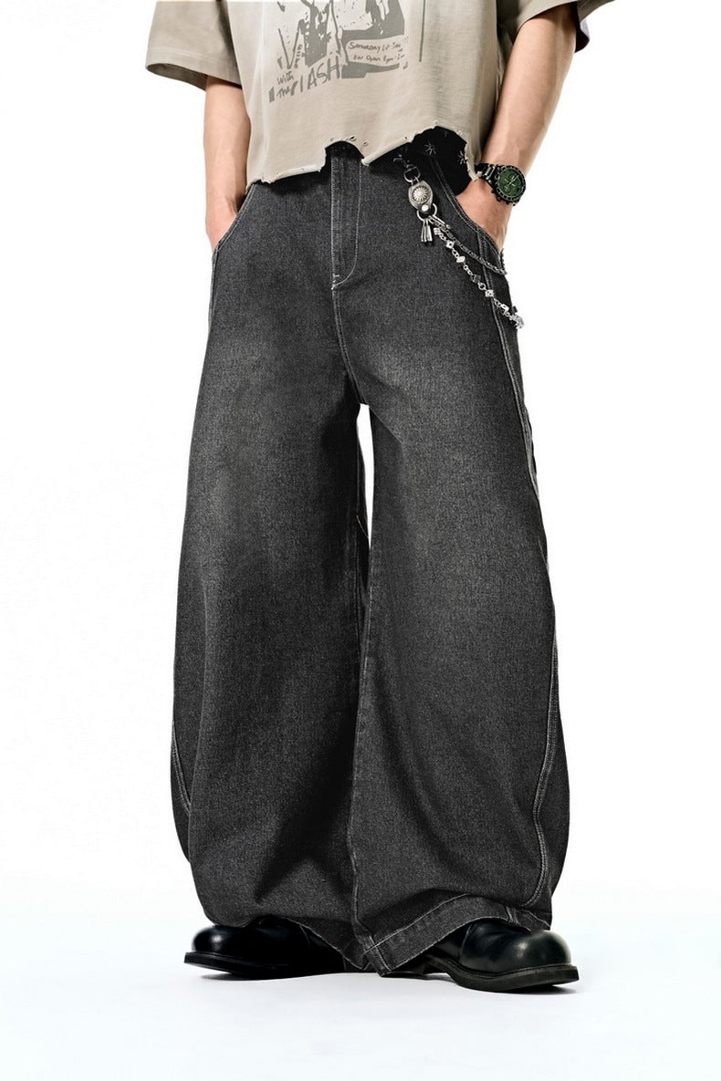 Black wide leg jeans close-up, pocket and seam detail
