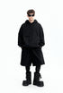 Black oversized hoodie front view on model, minimal street look