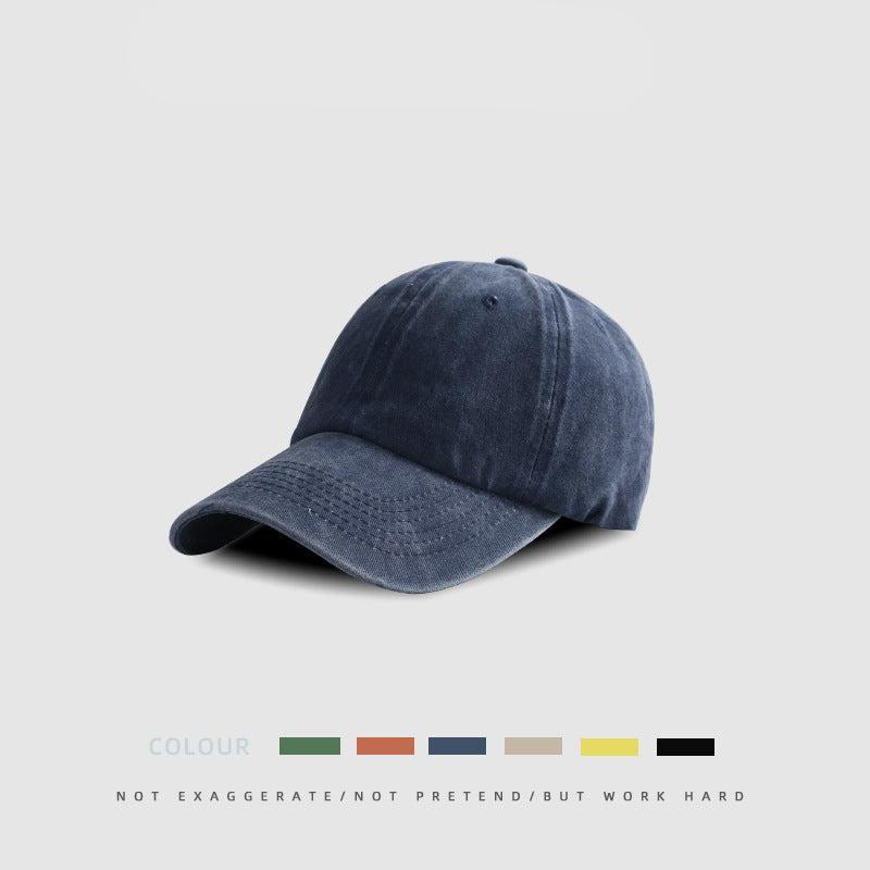 Navy blue washed cotton baseball cap with classic six-panel construction