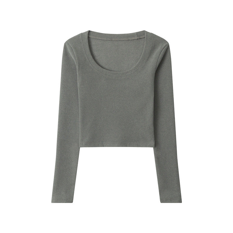 Gray long-sleeve crop top laid flat, featuring a scoop neckline and slim fit design.