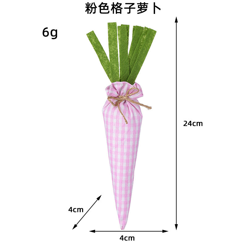 A pink gingham fabric carrot with green felt leaves, measuring 24cm in length and 4cm in width, weighing 6g.