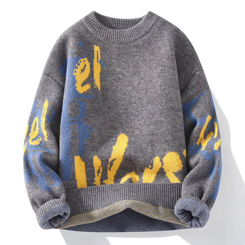 A gray crewneck sweater with blue and yellow abstract design pattern, featuring dropped shoulders and ribbed trim against white background