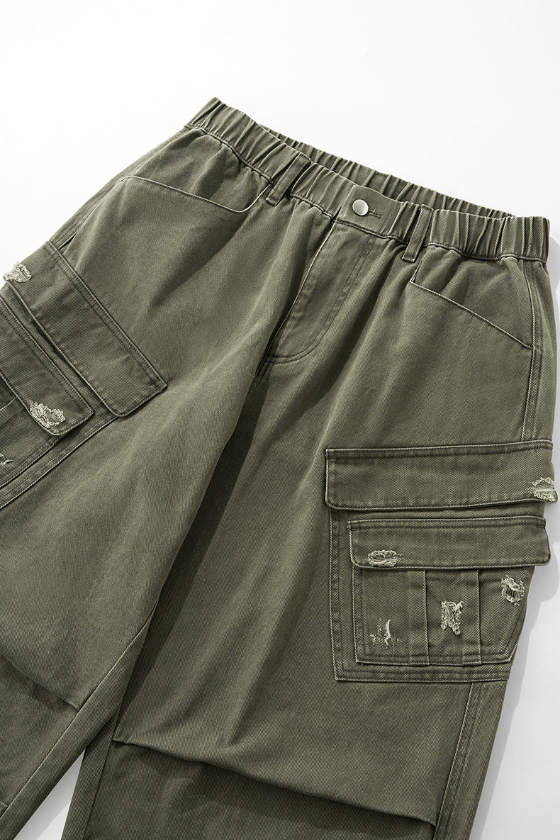 Army green cargo pants waistband and yoke detail, elastic back