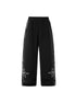 Product front flat—black baggy sweatpants, straight leg, mid-rise drawstring.