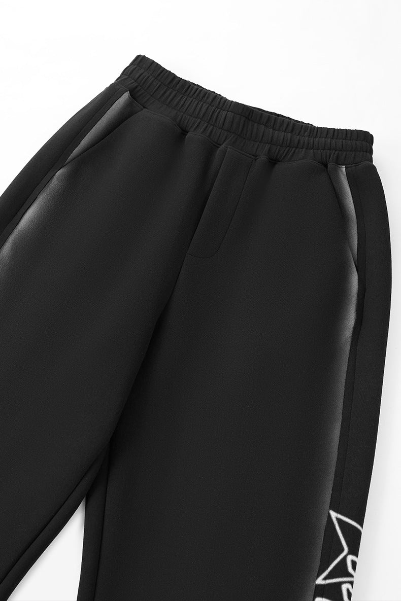 Waistband and hip seam detail—relaxed fleece sweatpants construction.