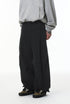 Black corduroy pants back view on model, elastic waist and relaxed fit