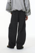 Black corduroy pants back view on model, relaxed wide leg