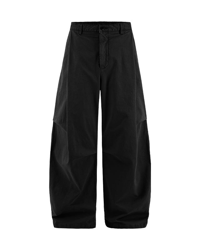 Black corduroy pants flat lay back, wide leg and patch pockets