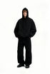 Black oversized hoodie full body on model, relaxed fit