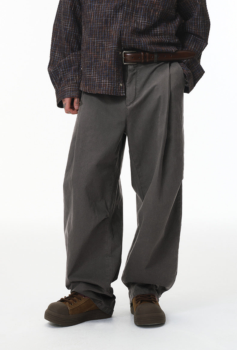 Charcoal corduroy pants front view on model, wide leg with straight cuff