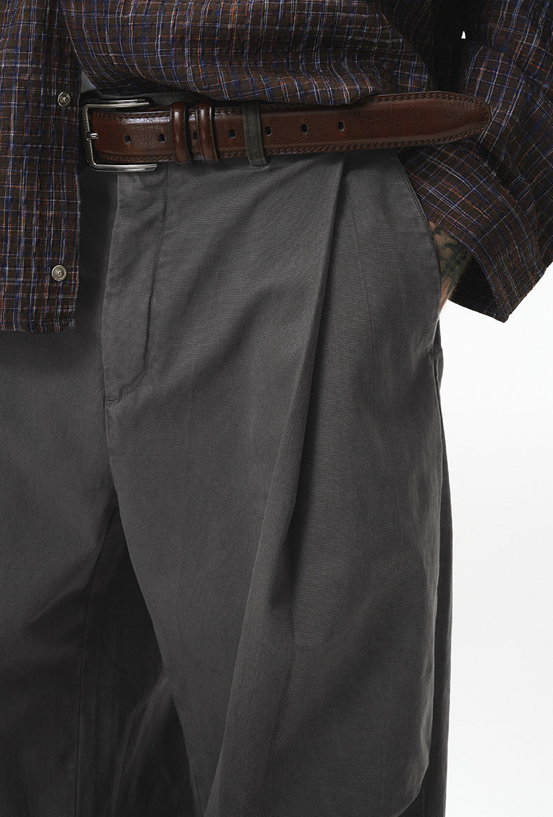 Charcoal corduroy pants waist and pocket close-up, belt detail
