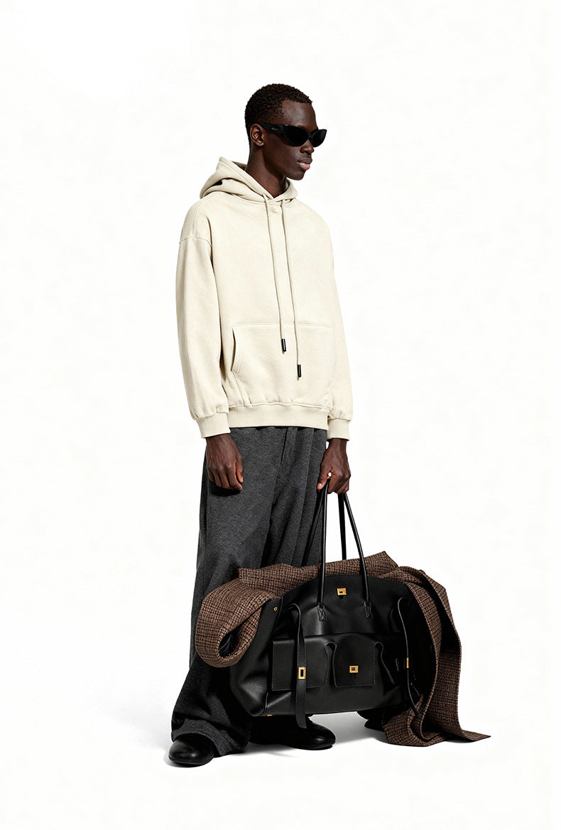 Cream oversized hoodie side view on model, soft fleece