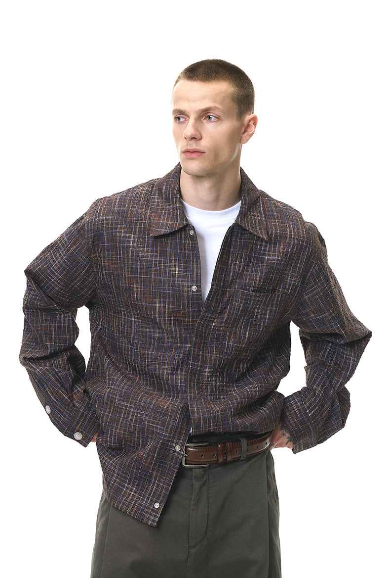 Dark brown plaid shirt three-quarter view, casual layer