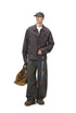 Dark-brown plaid shirt full-body with bag, angled stance