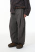 Charcoal corduroy pants side view, relaxed drape and roomy leg