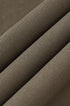 Close-up texture of khaki mens dress pants fabric with fine weave