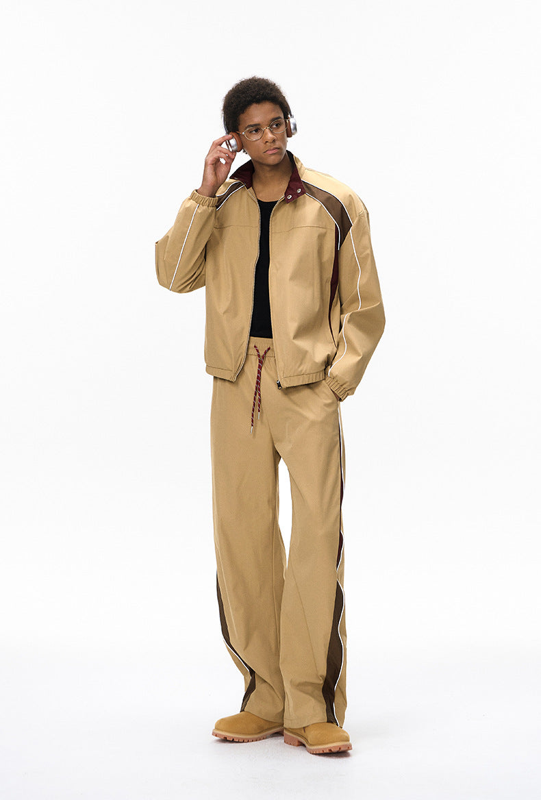 Khaki tracksuit front pose, racing jacket with wide leg pants, relaxed fit