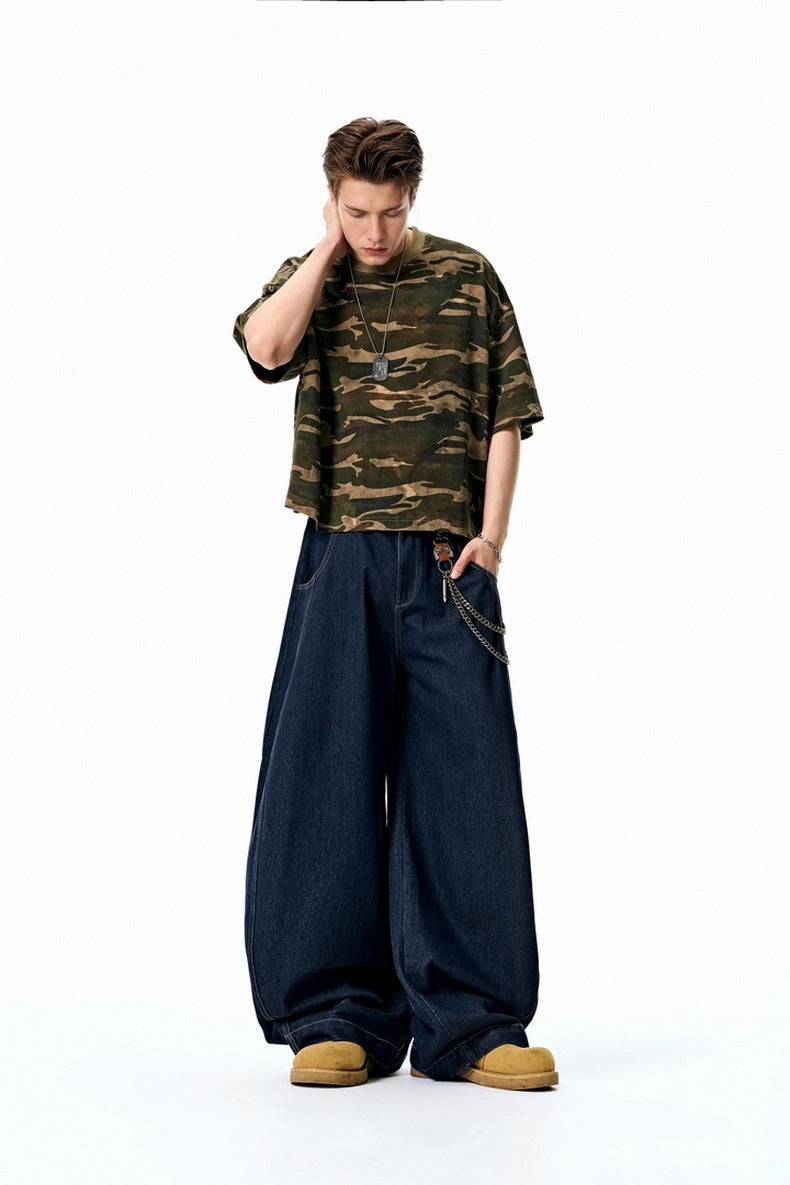 Dark blue mid rise wide leg jeans front view, deep rinse