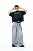 Light blue mid rise wide leg jeans front view, washed finish