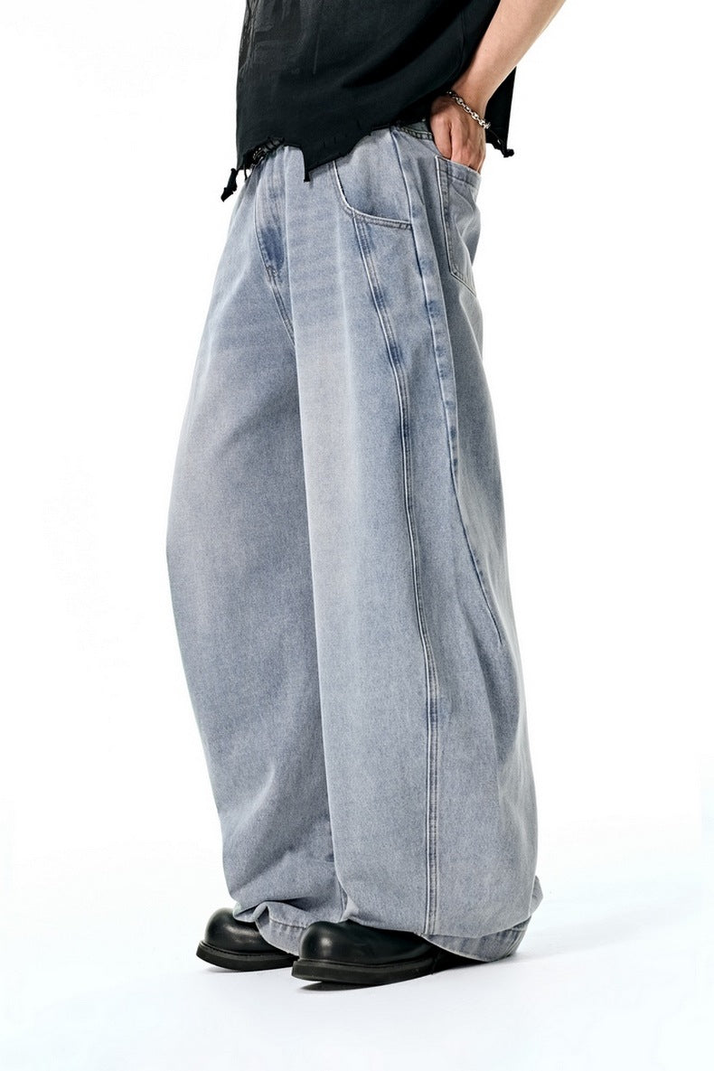 Light blue wide leg jeans side step, relaxed drape