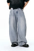Light blue wide leg jeans detail, soft washed denim texture