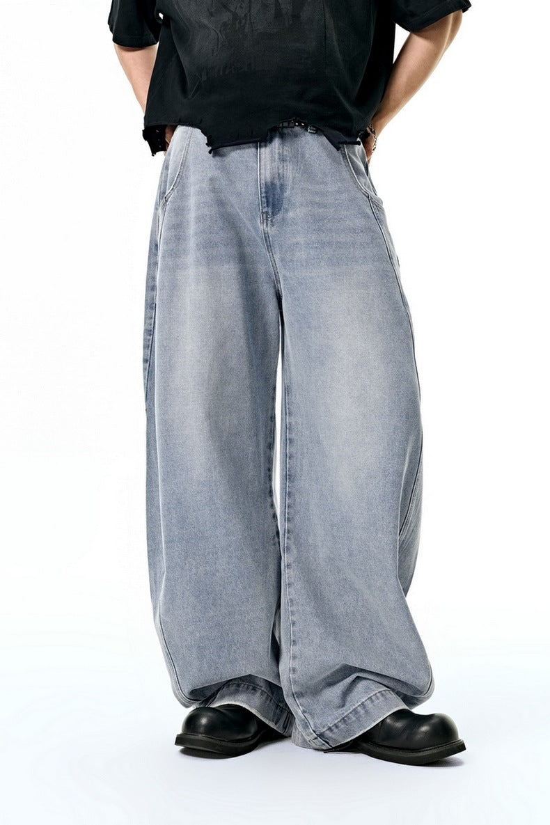 Light blue wide leg jeans detail, soft washed denim texture