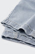 Light blue wide leg jeans detail, soft washed denim texture