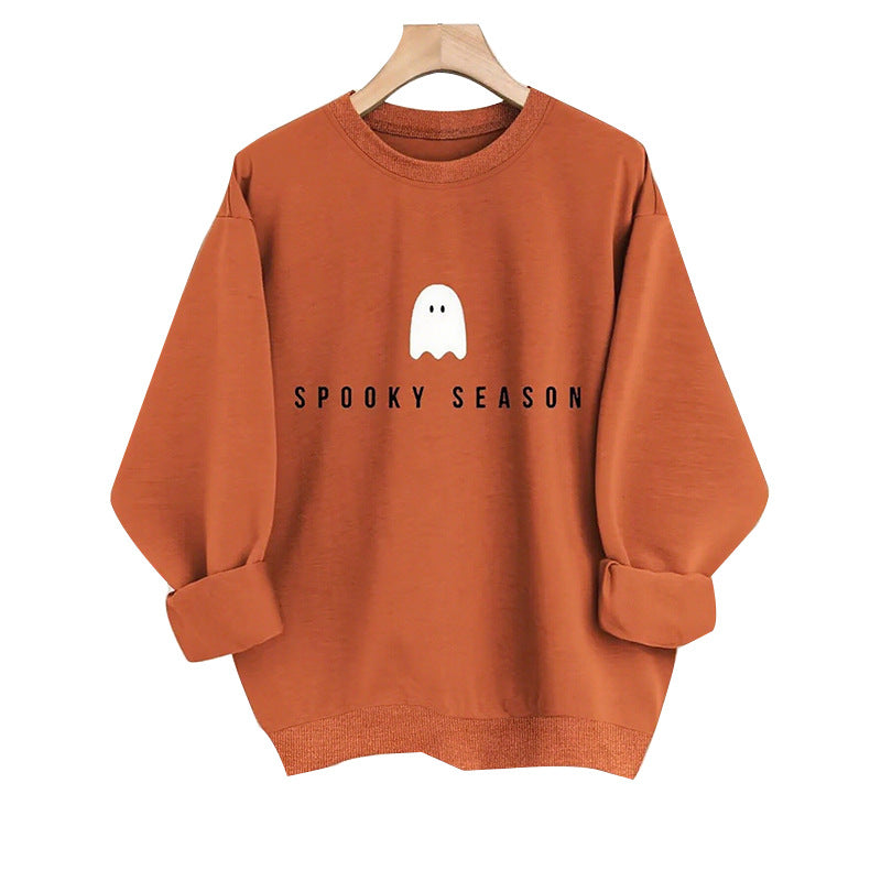 Terracotta mock neck oversized sweatshirt front on hanger, rolled cuffs