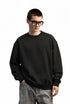 Men’s oversized sweatshirt black on model, half-body front