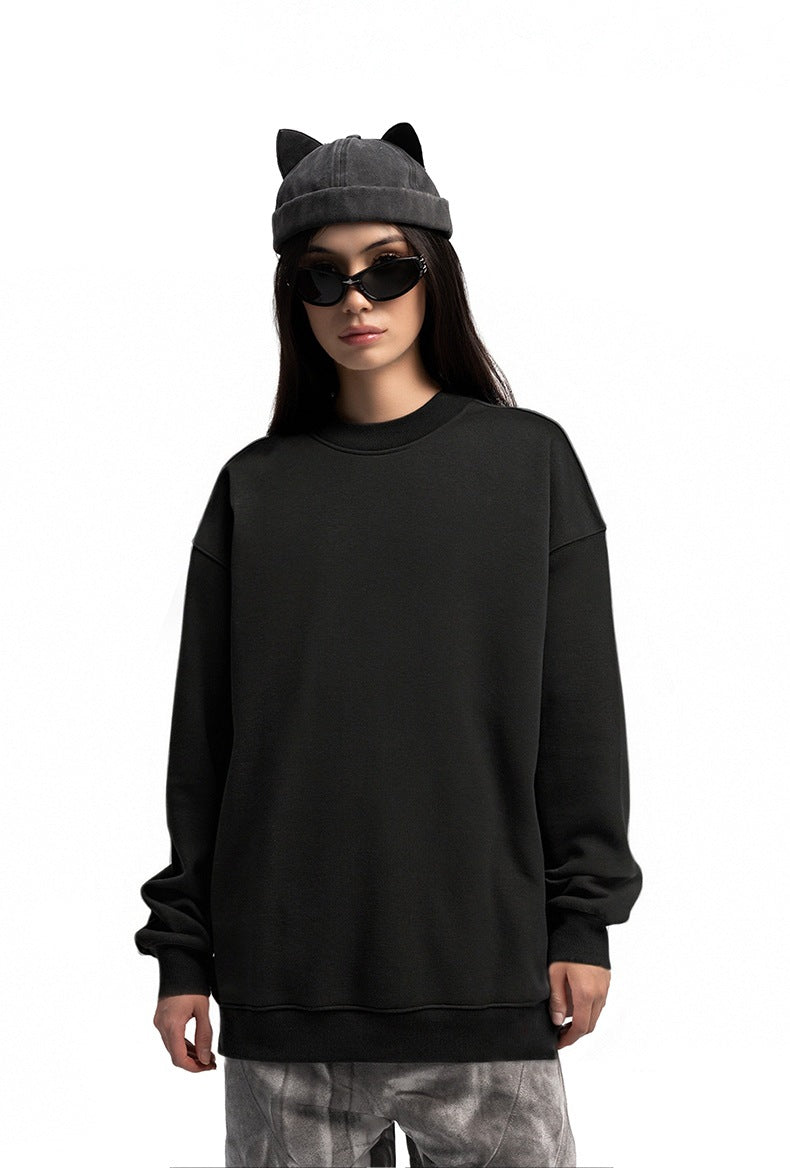 Women’s oversized sweatshirt black front view with beanie and sunglasses