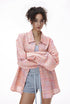 Pink plaid shirt open over mini dress, casual layer