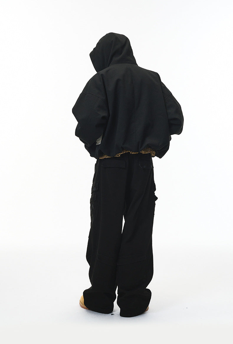 Black plush zip jacket, back view with hood.