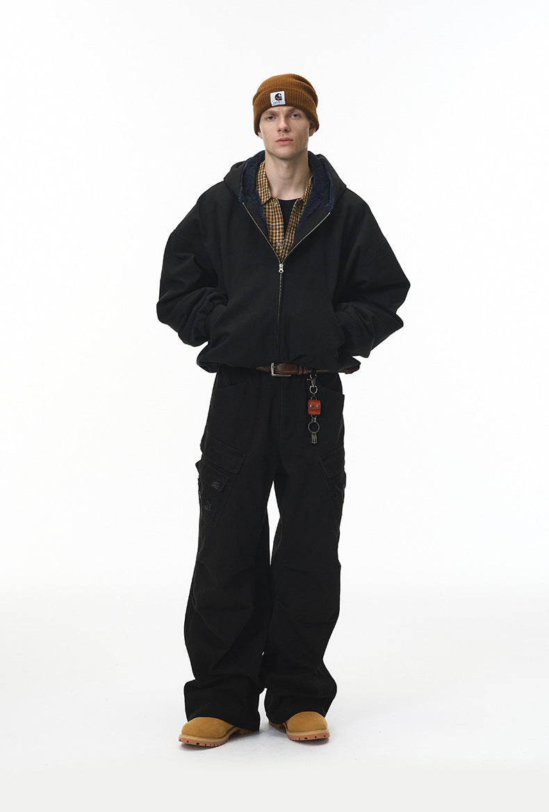Black plush zip jacket, on-body front with wide pants.