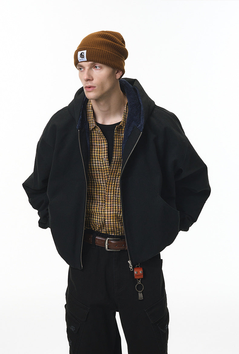 Black plush zip jacket, open to show fleece lining.