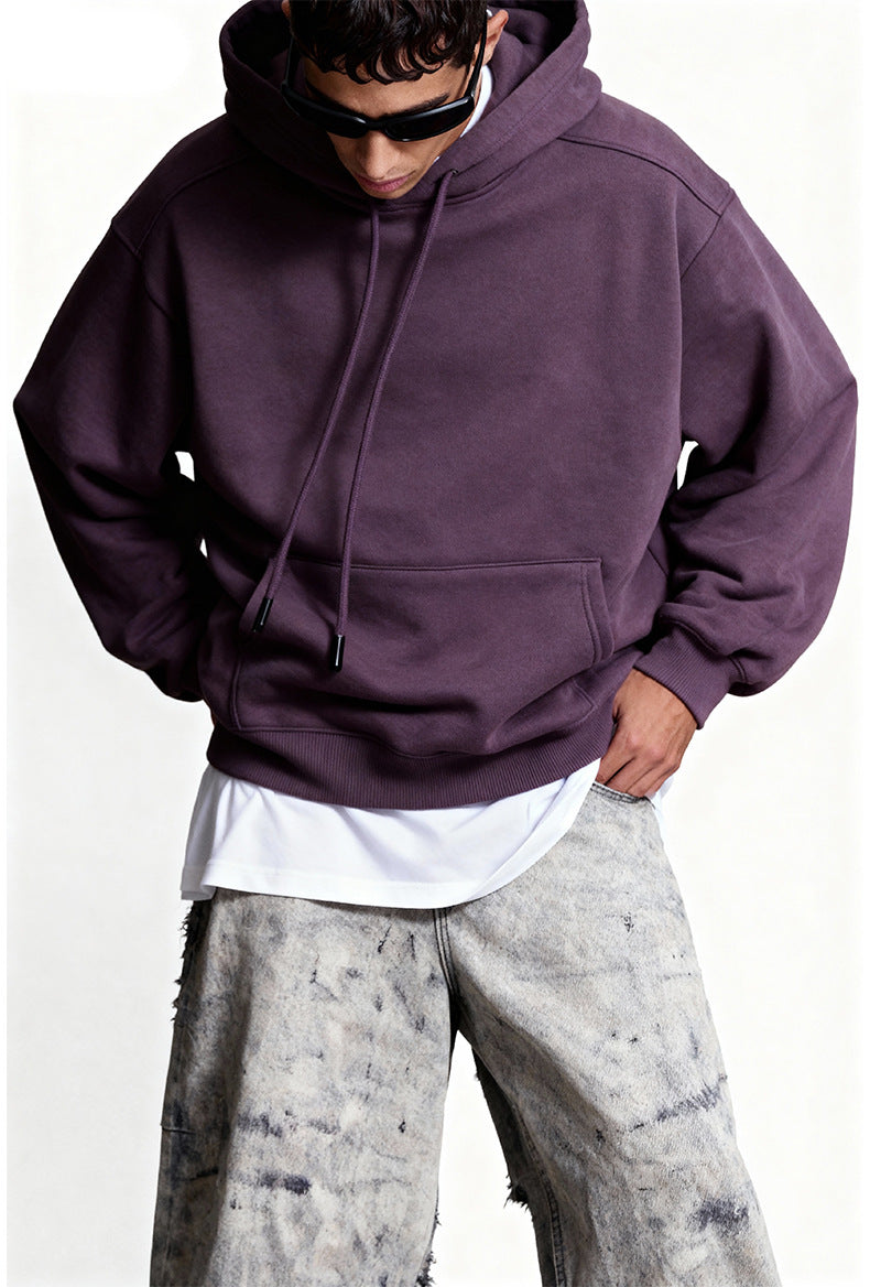 Purple oversized hoodie close-up, kangaroo pocket and rib hem