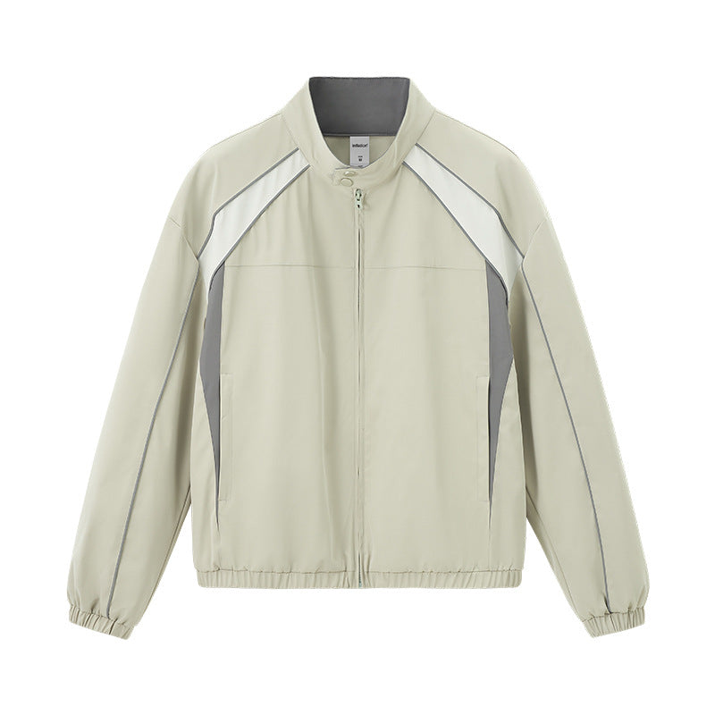 Gray racing jacket flat lay front, contrast arcs and zip pockets