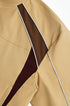 Khaki racing stripe insert and piping detail close-up