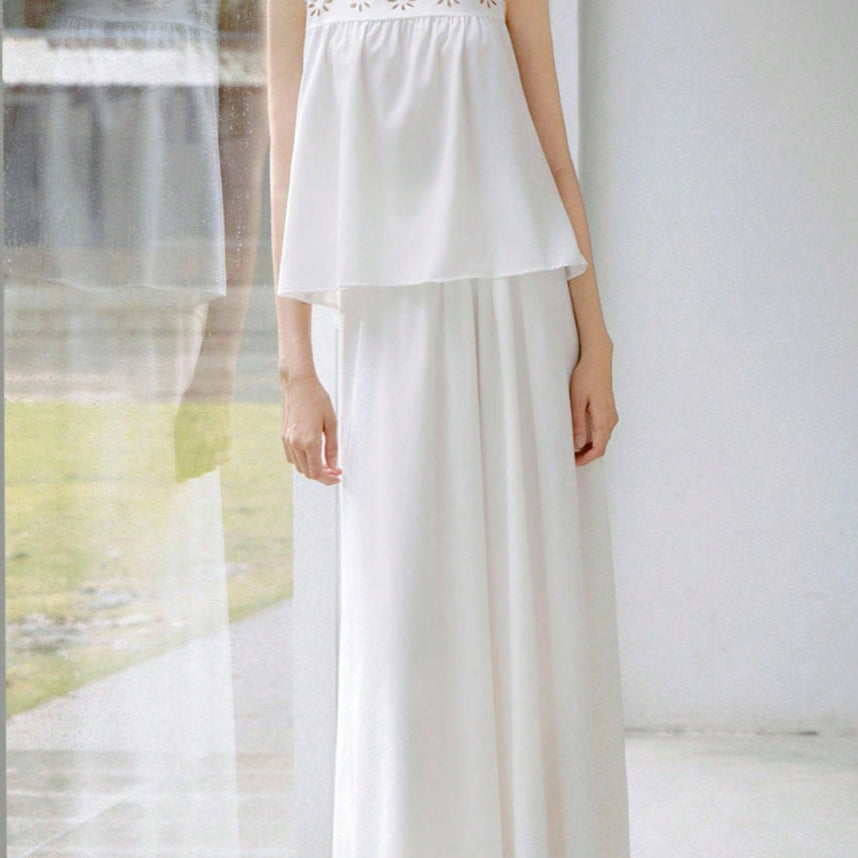 White two piece outfit with floral hem and airy top