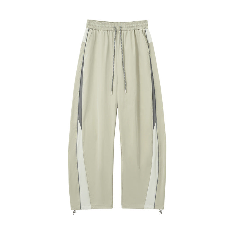 Gray wide leg track pants flat lay front, straight cuff and stripes
