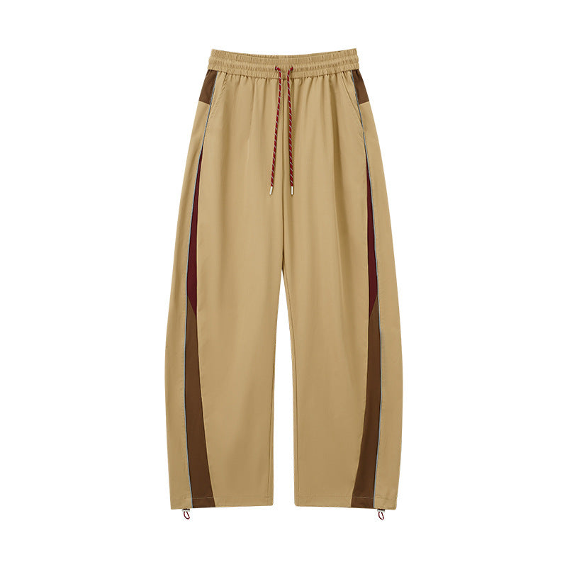 Khaki wide leg track pants flat lay front, straight cuff and stripes
