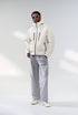 Off-white windbreaker jacket angled front, full body