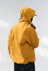 ellow windbreaker jacket back view, relaxed hem and cuffs
