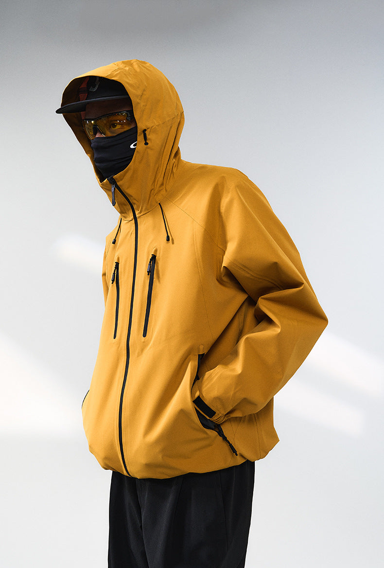 Yellow windbreaker jacket profile close-up, chin guard and hood