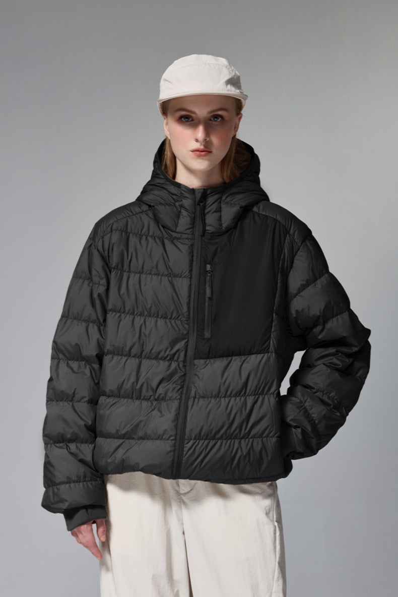 Black women’s puffer jacket three-quarter view on model