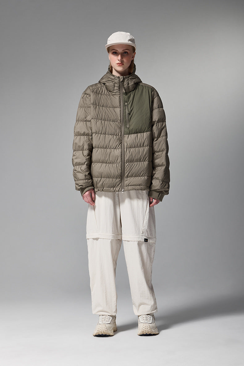 Brown women’s puffer jacket front on model, casual styling