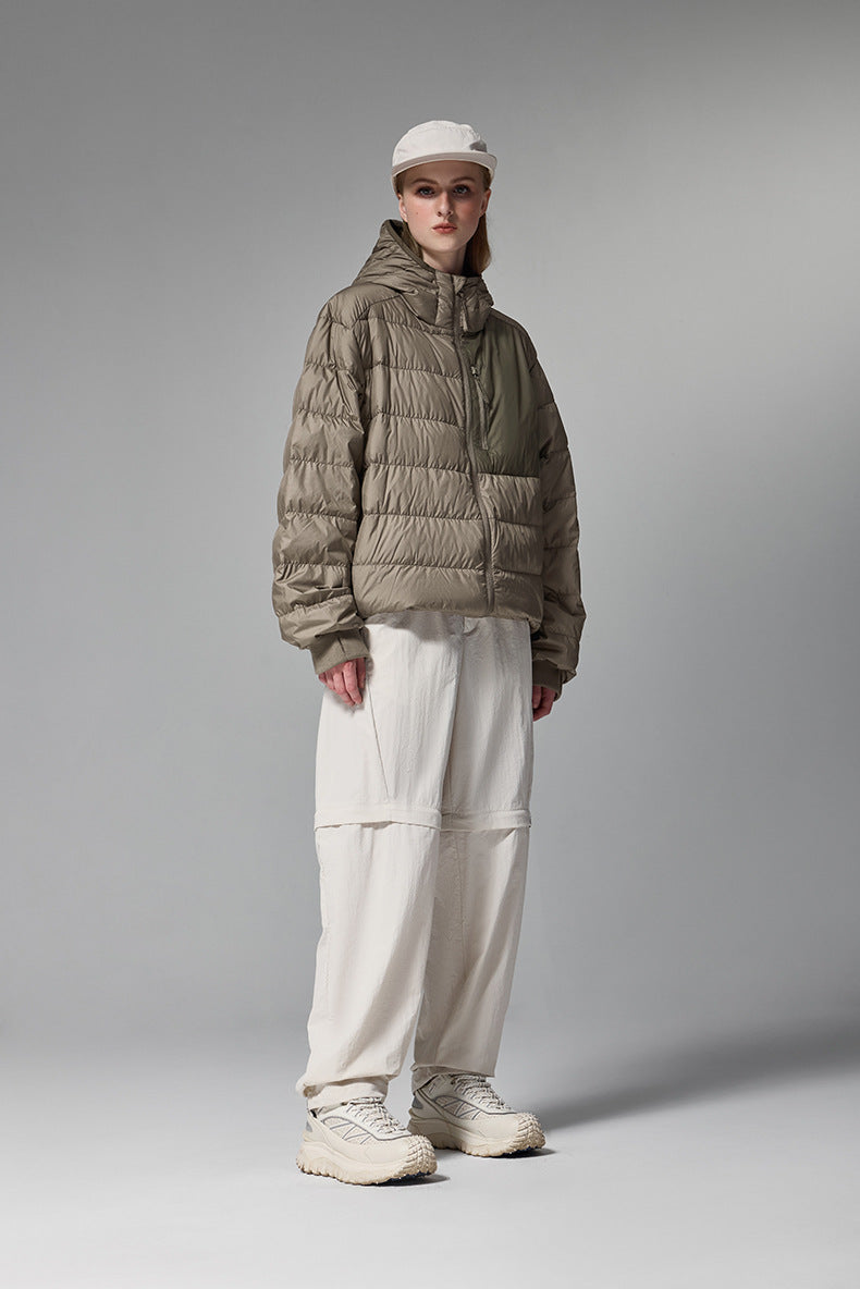 Brown women’s puffer jacket side profile, elastic hem