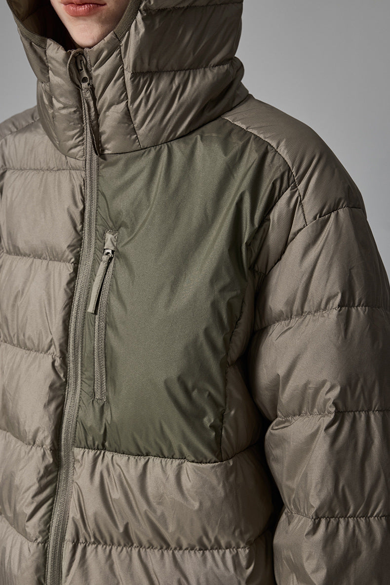 Brown women’s puffer jacket three-quarter view with zip pockets